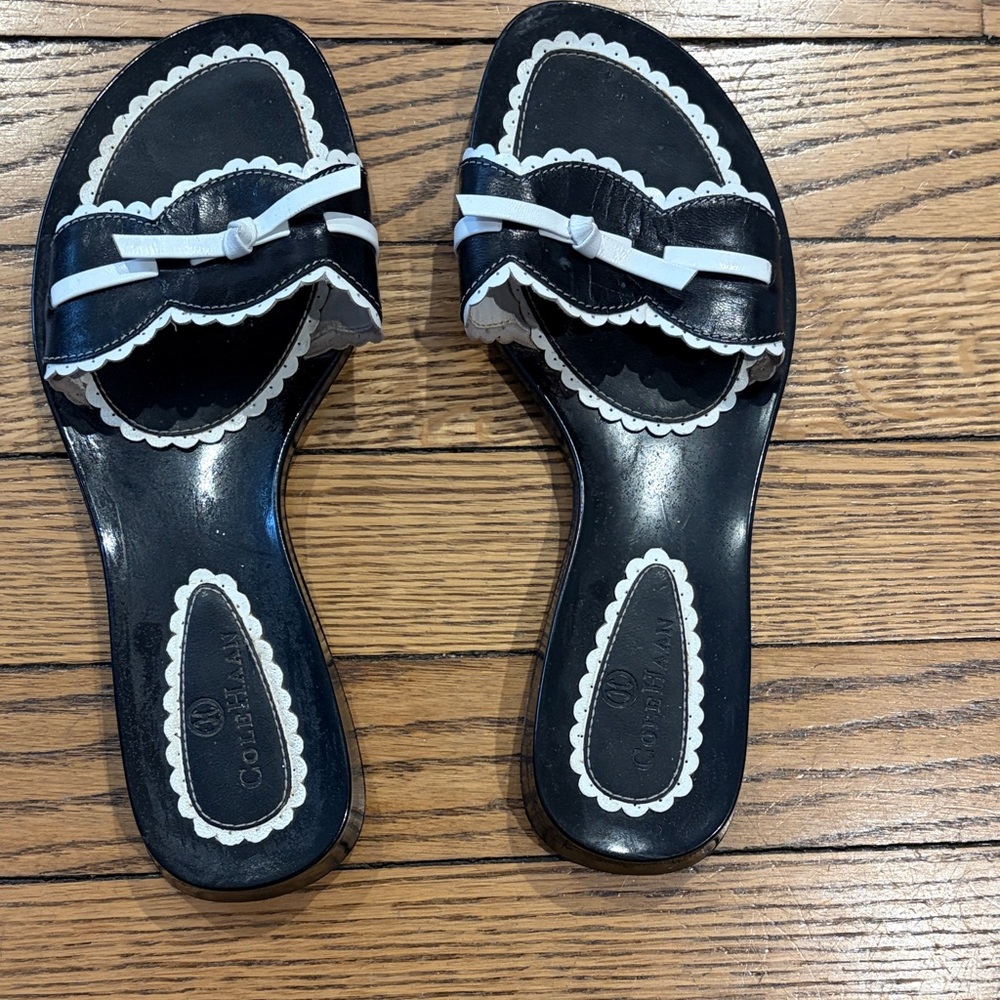 Cole Haan Black and White Scalloped Bow Slide Sandals